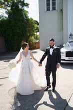 C2023-VS85 - sleeveless v-neck fitted wedding gown with embellished over skirt