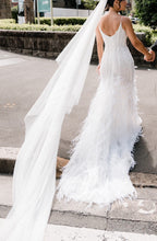 C2024-FF302 - fitted wedding gown with beading, feathers and spaghetti shoulder strap