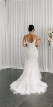 C2024-FF302 - fitted wedding gown with beading, feathers and spaghetti shoulder strap
