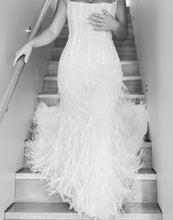 C2024-FF302 - fitted wedding gown with beading, feathers and spaghetti shoulder strap