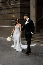C2023-B638 - sleeveless beaded v-neck wedding gown with detachable over skirt