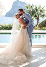 C2023-SS83D - spaghetti strap sweetheart beaded wedding gown with overskirt