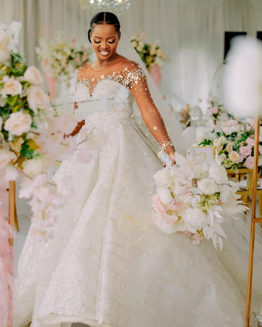 C2023-LSF91G - Illusion neckline sheer long sleeve beaded ball gown wedding dress
