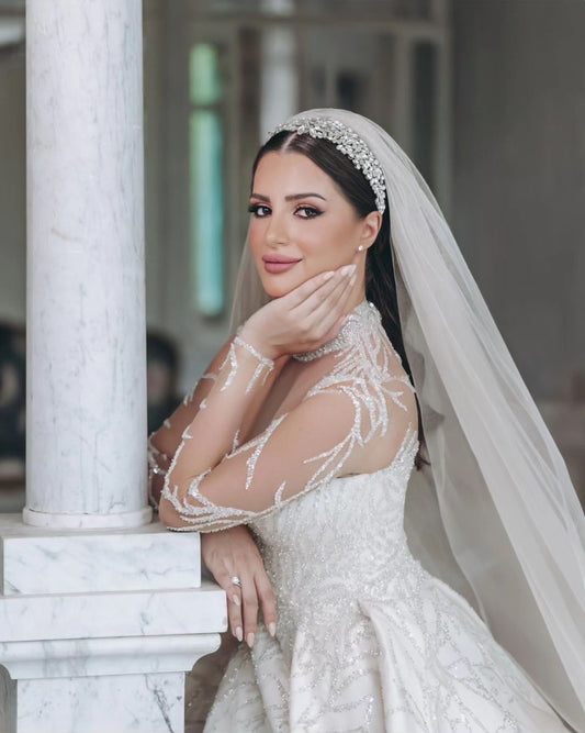 C2023-IN52 - long sleeve sheer illusion neck line beaded wedding gown