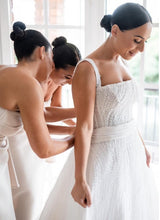 C2024-BA503 - Beaded White fitted wedding gown with detachable train and shoulder straps