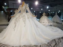 Style 820-23  Long sleeve bling wedding gown