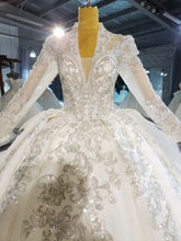 Style 820-23  Long sleeve bling wedding gown
