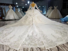 Style 820-23  Long sleeve bling wedding gown