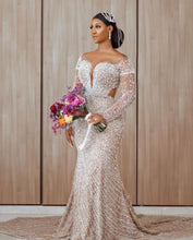 C2022-BB28 - Vestido de novia transparente de manga larga con pedrería de cristales y perlas