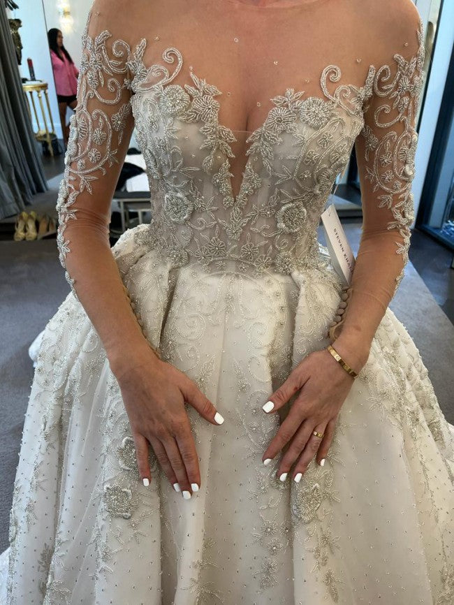 C2022-SLS009 - Robe de bal de mariage perlée à manches longues et décolleté illusion transparent