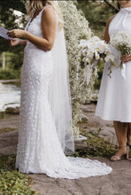C2023-SV0213 sleeveless v-neck white wedding gown with 3D embellishments