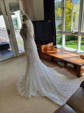 C2023-SSV610 sexy v-neck lace wedding gown with spaghetti straps