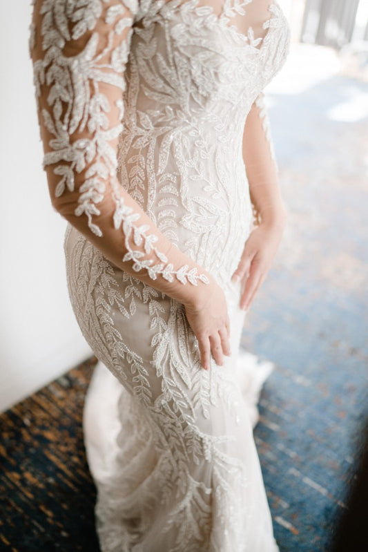 C2023-B551 - sheer illusion neck long sleeve wedding gown with detachable overskirt
