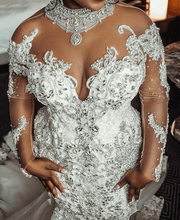 C2021-BiM012 - Robe de mariée transparente à manches longues et col illusion avec perles de cristal et traine cathédrale