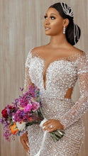 C2022-BB28 - Vestido de novia transparente de manga larga con pedrería de cristales y perlas