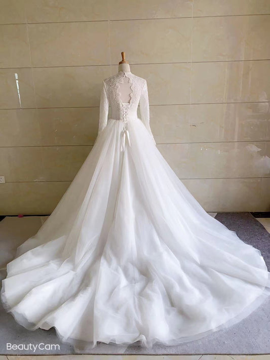 Robe de mariée trapèze transparente à manches longues