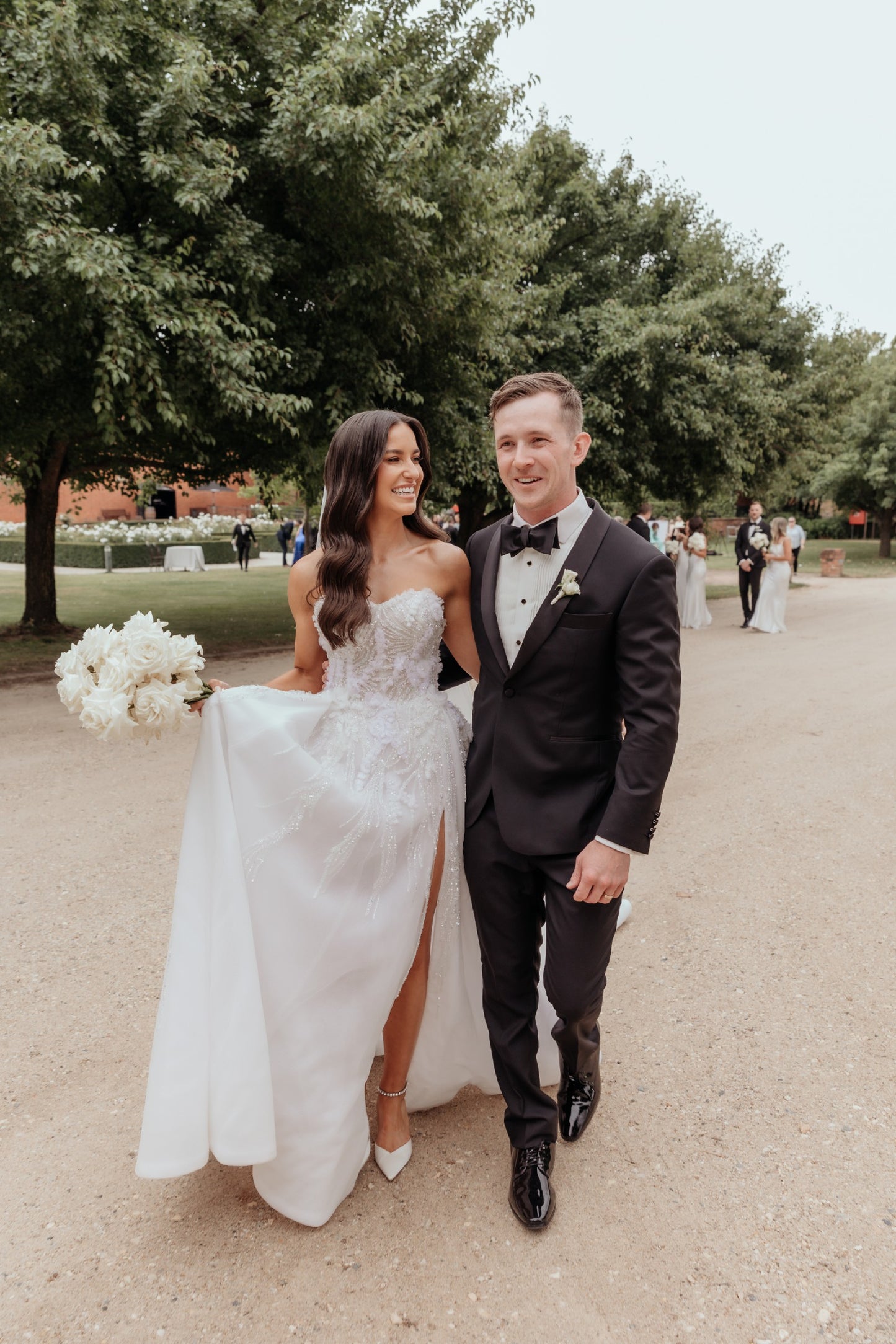 C2023-SS63P - strapless sweetheart beaded wedding gown with thigh high split and detachable train