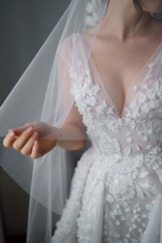 C2023-VS85 - sleeveless v-neck fitted wedding gown with embellished over skirt