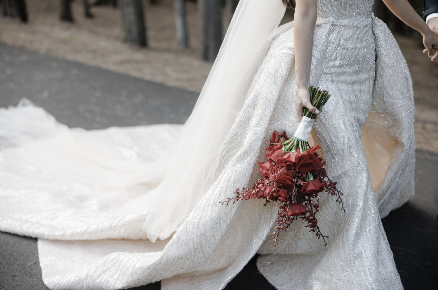 C2023-SD861 - sleeveless open neck line wedding gown with a beaded detachable train