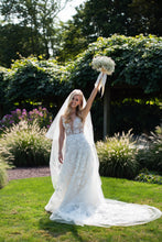 C2023-SV74A - sleeveless illusion v-neck aline wedding gown