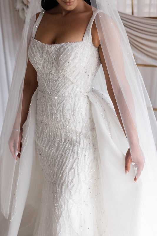 C2024-SB44 - sleeveless beaded wedding gown with open bust line and detachable train