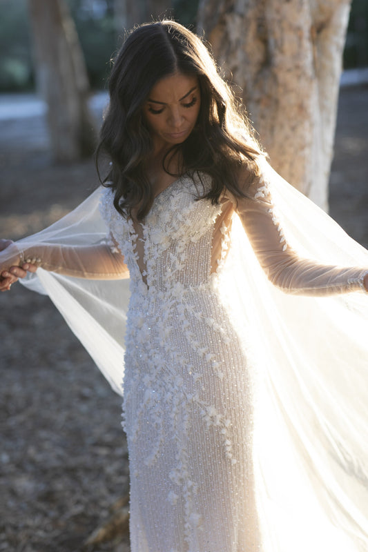 C2024-LS81s - sheer long sleeve embellished wedding gown with sexy v-neck bustline
