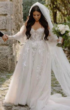 C2024-SLS767GL - strapless a-line wedding gown with detachable long sleeves and corset bodice