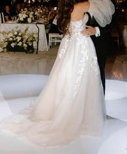 C2024-SLS767GL - strapless a-line wedding gown with detachable long sleeves and corset bodice