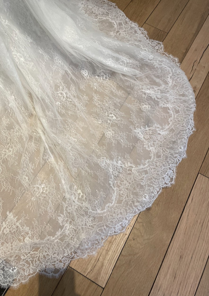 C2023-SBB4 - strapless fitted wedding gown with flowing over skirt