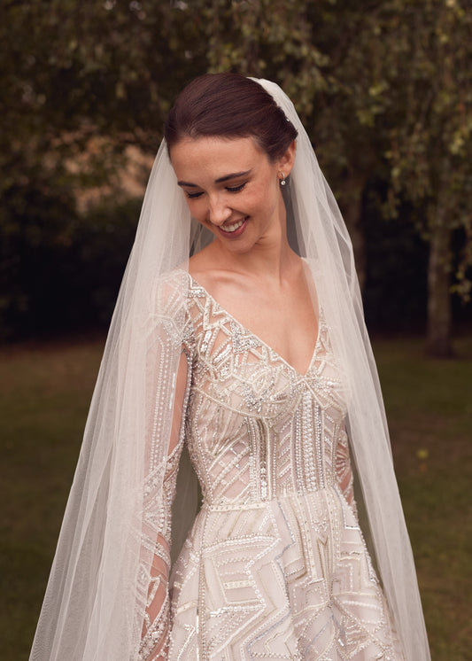 C2023-BLS48V - sheer long sleeve beaded v-neck a-line style wedding gown