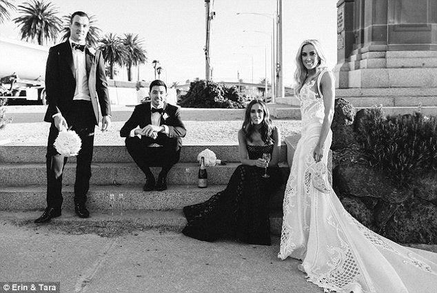 C2020-MArnold – ornate sleeveless fit-to-flare embroidered wedding gown