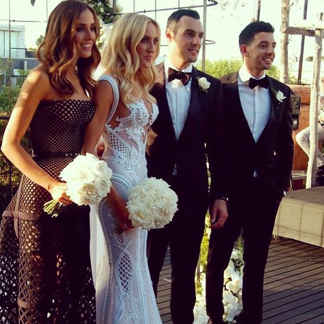 C2020-MArnold – ornate sleeveless fit-to-flare embroidered wedding gown