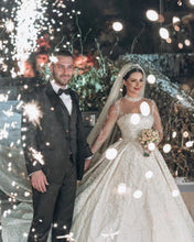 C2023-IN52 - Vestido de novia con pedrería y escote ilusión transparente de manga larga