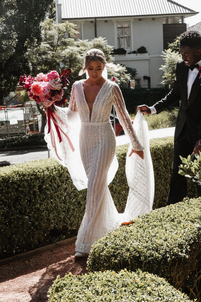 C2023-VLS19b sexy v-neck long sleeve beaded wedding gown