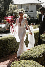 C2023-VLS19b sexy v-neck long sleeve beaded wedding gown