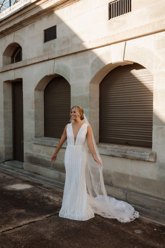 C2023-VLS19b sexy v-neck long sleeve beaded wedding gown