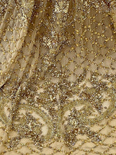 C44307 - Sleeveless gold beaded pageant gown dress with v-neck and empire waist line
