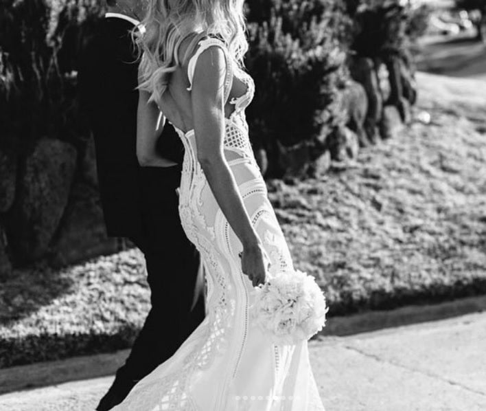 C2020-MArnold – ornate sleeveless fit-to-flare embroidered wedding gown