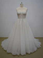 Style MA21044 - Strapless a-line empire waist beaded wedding gown