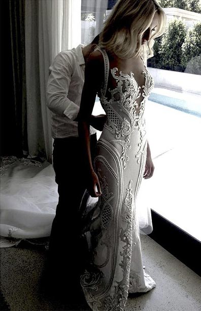 C2020-MArnold – ornate sleeveless fit-to-flare embroidered wedding gown