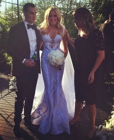 C2020-MArnold – ornate sleeveless fit-to-flare embroidered wedding gown