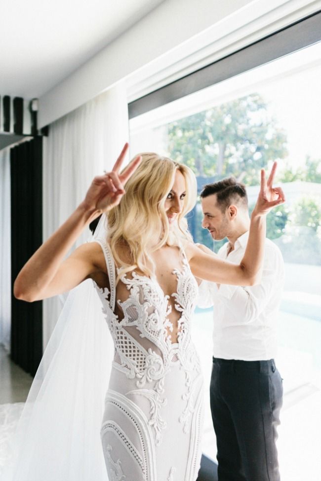 C2020-MArnold – ornate sleeveless fit-to-flare embroidered wedding gown