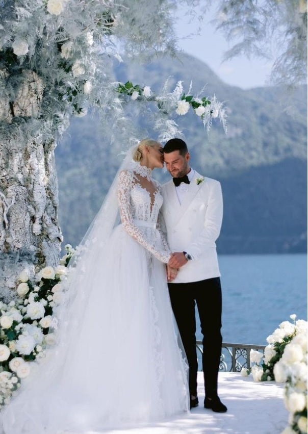 C2024-LS119 - Robe de mariée en dentelle à manches longues avec décolleté illusion et traîne amovible