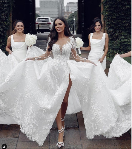 C2024-LSV11 - Vestido de novia transparente de manga larga con escote ilusión y abertura en la pierna