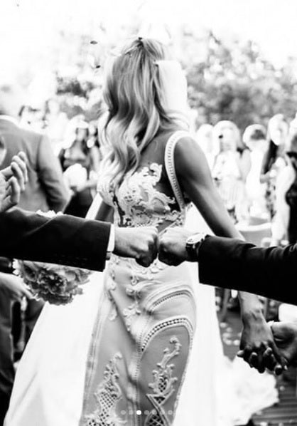 C2020-MArnold – ornate sleeveless fit-to-flare embroidered wedding gown