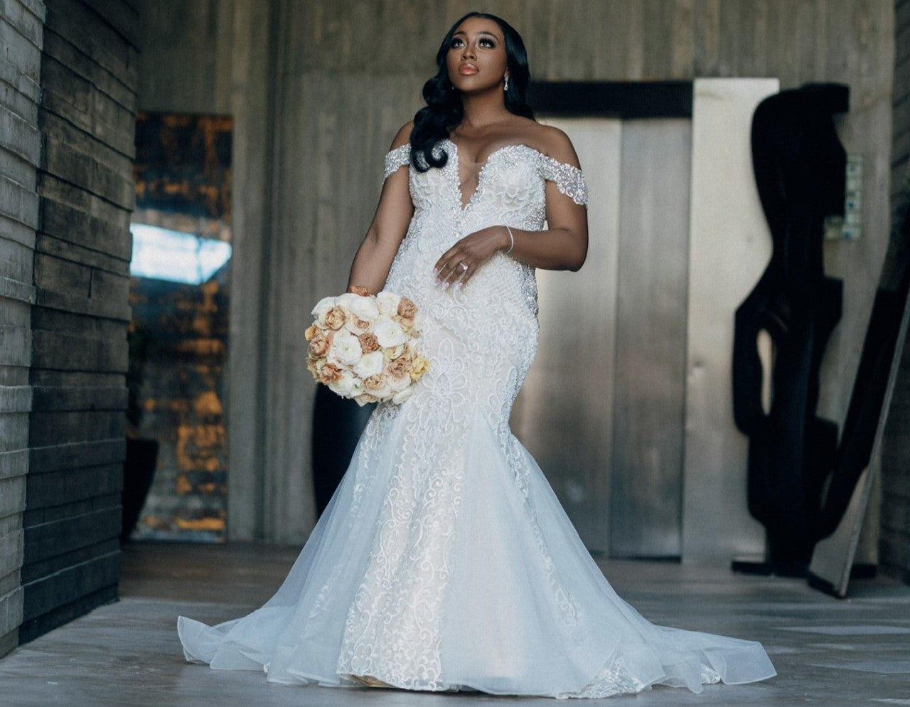 C2025-EA606 - Off the shoulder fit-to-flare beaded lace wedding gown