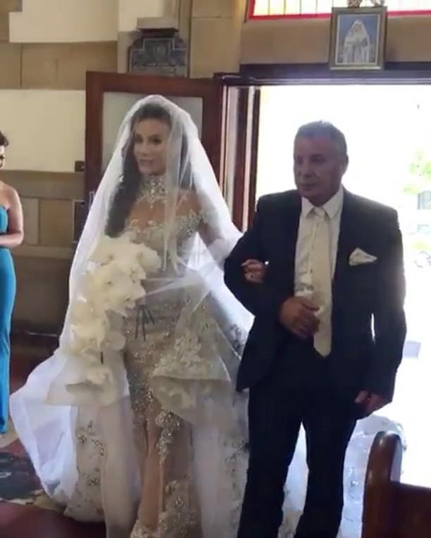 C2020 - BLS989 - swarovski crystal beaded long sleeve illusion neckline wedding gown with detachable over skirt train