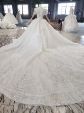 Style 820-16 Short sleeve v-neck beaded wedding gown from DARIUS BRIDAL