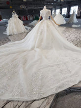 Style 820-16 Short sleeve v-neck beaded wedding gown from DARIUS BRIDAL