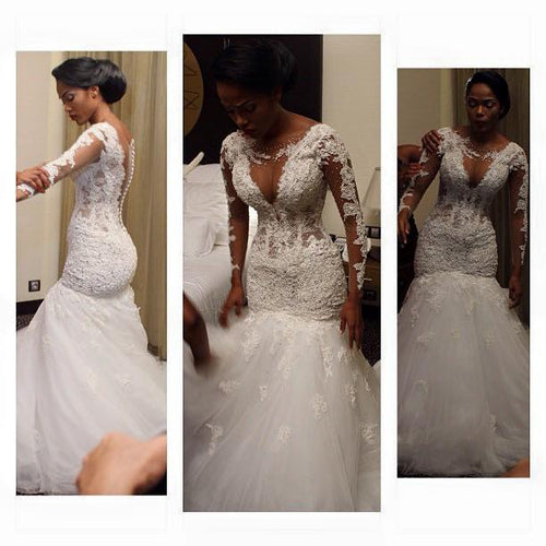 Long sleeve lace bridal gown with illusion bust line